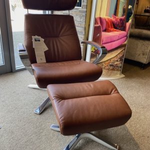 Style chair and footstool in cognac leather